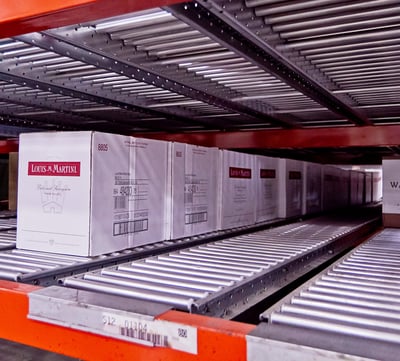 carton flow rollers in a beverage warehouse